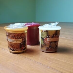 Three votive candles, new in wrapper